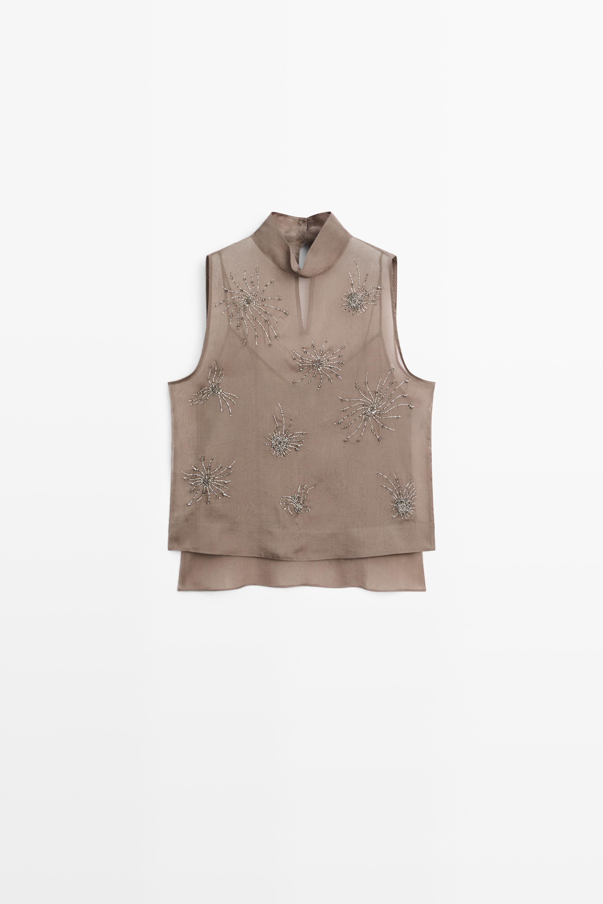 Semi-sheer top with embroidered detail